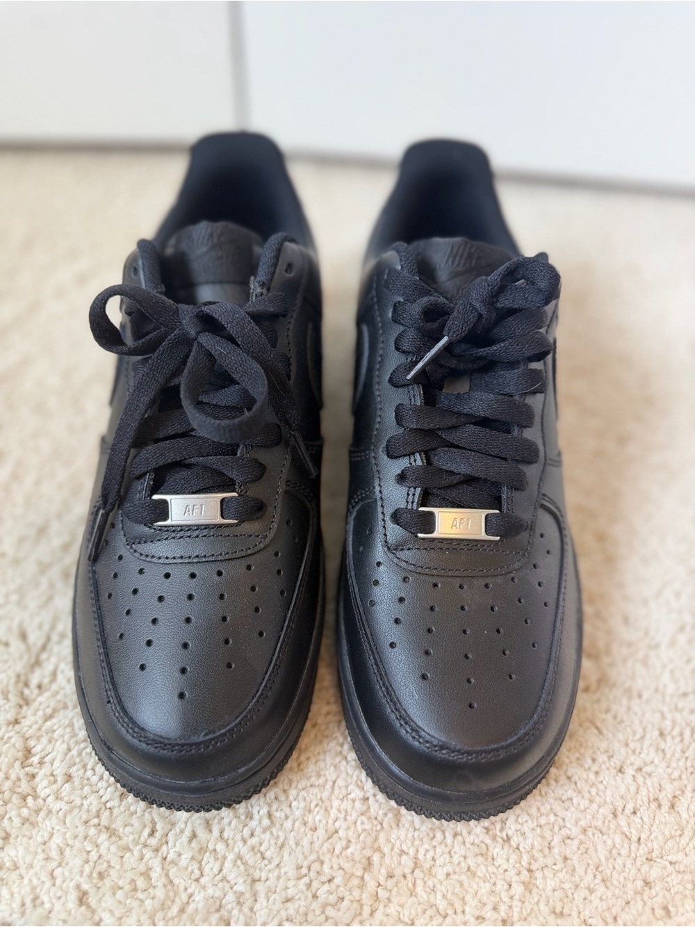Nike All-Black Low-Top Sneakers
